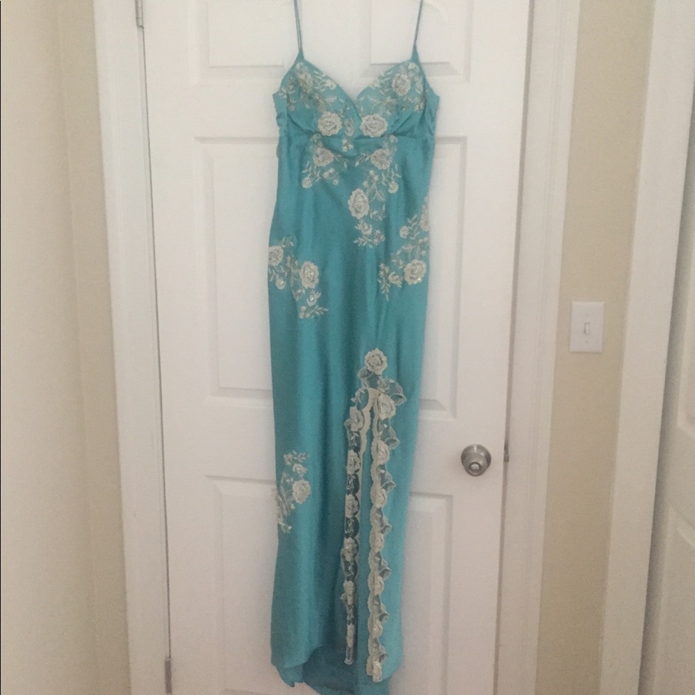 Floor length evening gown with flower detail